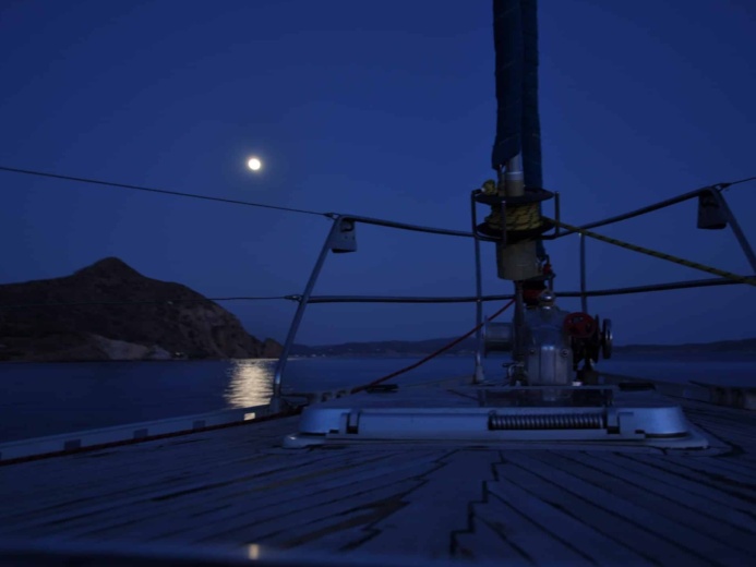 Romantic dinner on board a yacht under the nightsky and moon photo #1